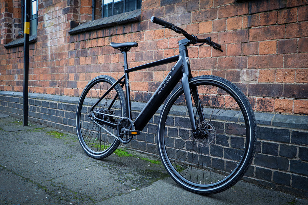 Falcon Zone Electric Hybrid Bike - parked on a city street — view 24