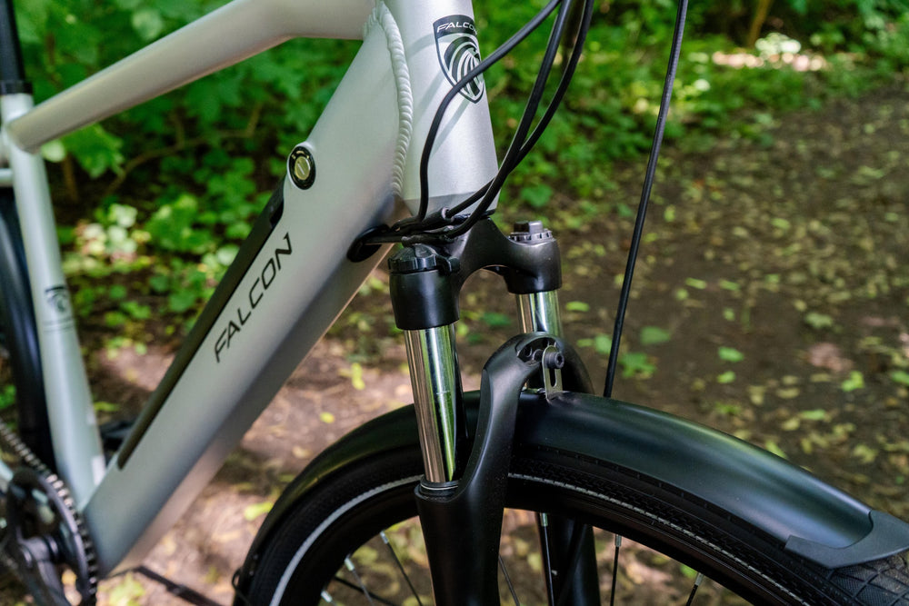 Falcon Horizon Cross Bar Electric Hybrid Bike - suspension fork and head badge — view 18