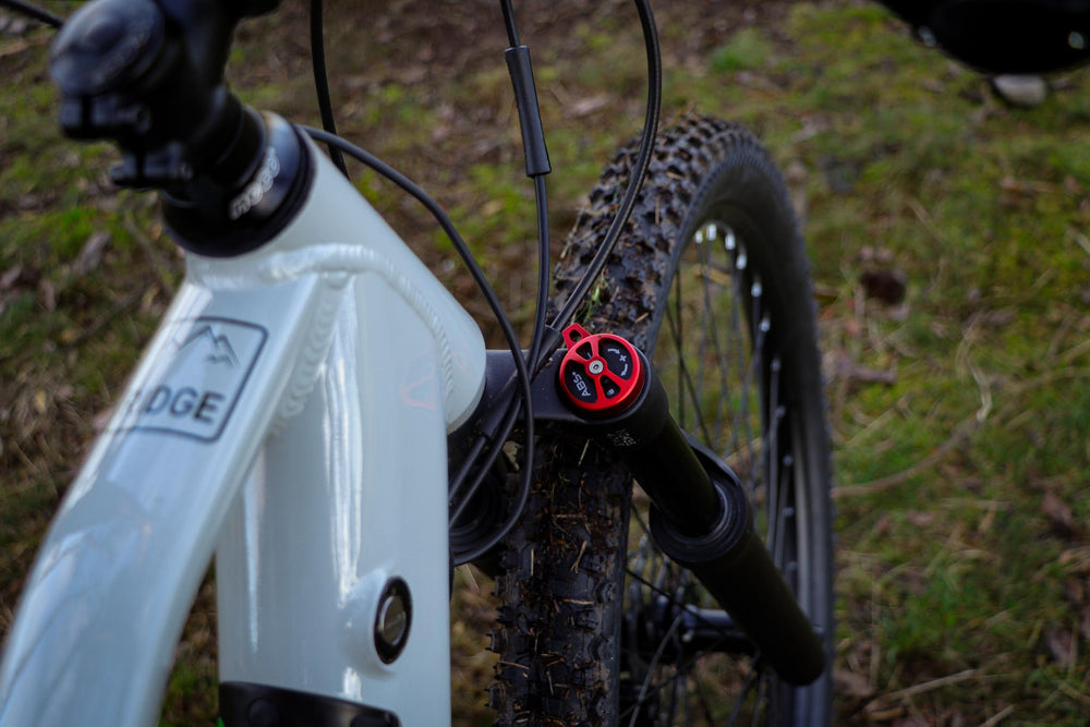 Claud Butler Ridge 1.0 Electric Mountain Bike - fork lockout and Ridge head badge — view 30