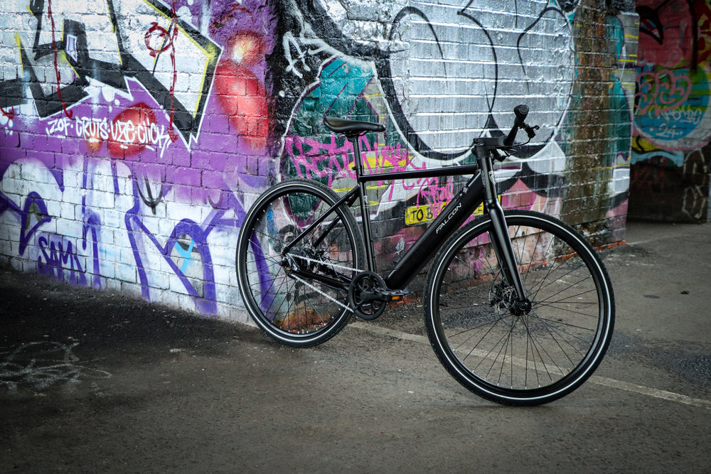 Falcon Zone Electric Hybrid Bike - against a graffiti wall — view 29