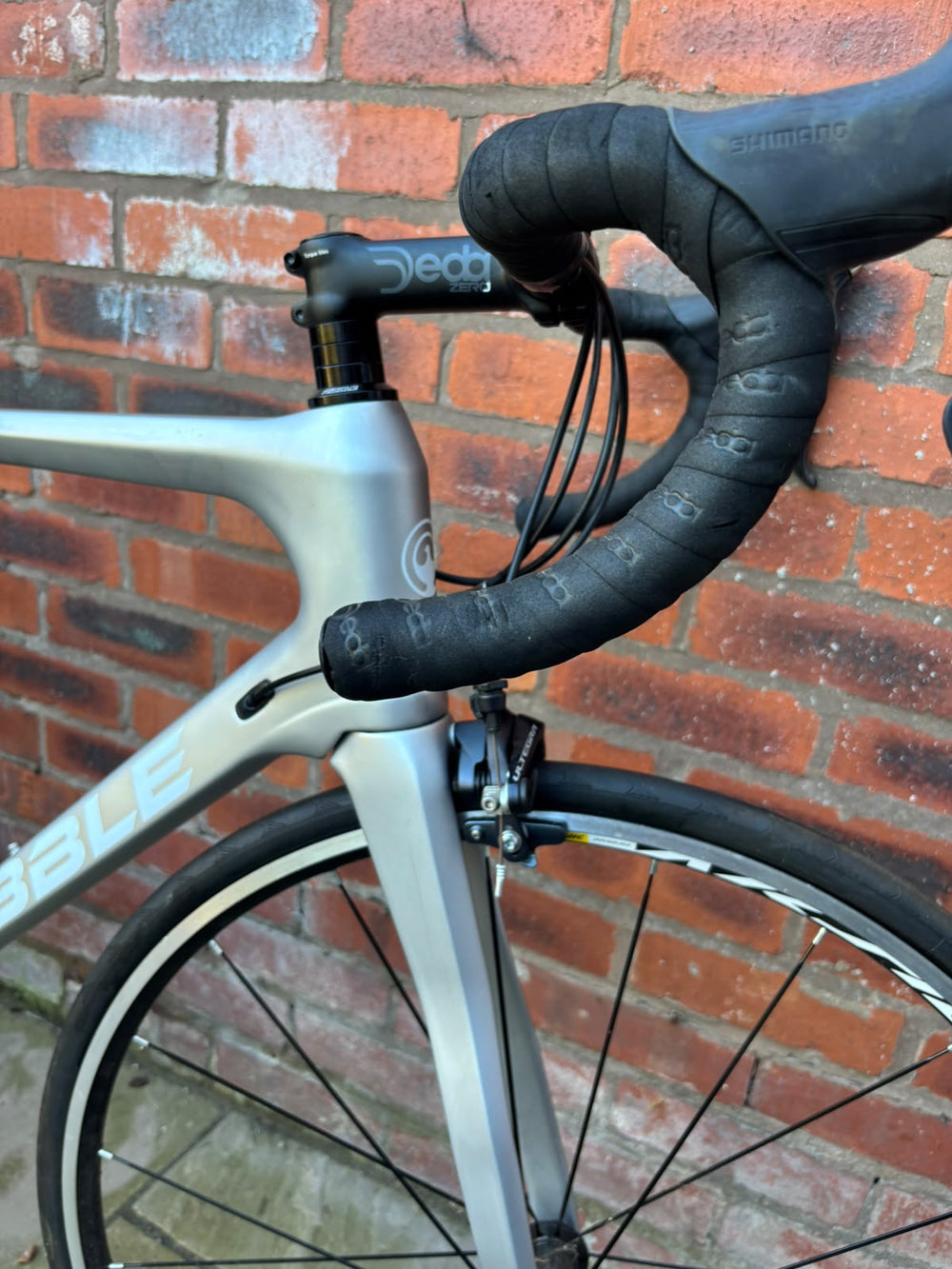 Ribble carbon road bike front end with Deda Zero stem, drop handlebars and Ultegra front brake — view 6
