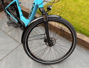 Trek Verve+ 2 front wheel with SR Suntour suspension fork, hydraulic disc brake, mudguard and Schwalbe Active Plus tyre — view 5